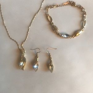 Gold necklace, bracelet and earrings